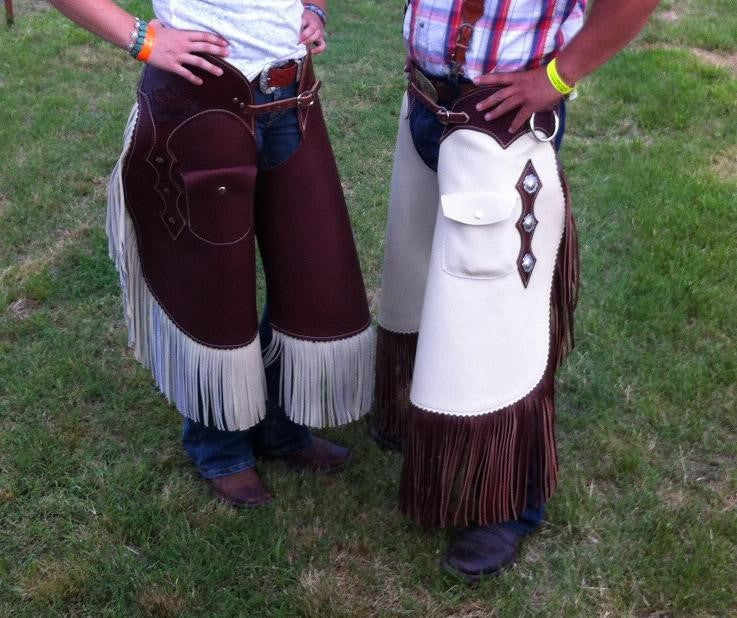 Two cowboys wearing Buckaroo Chinks